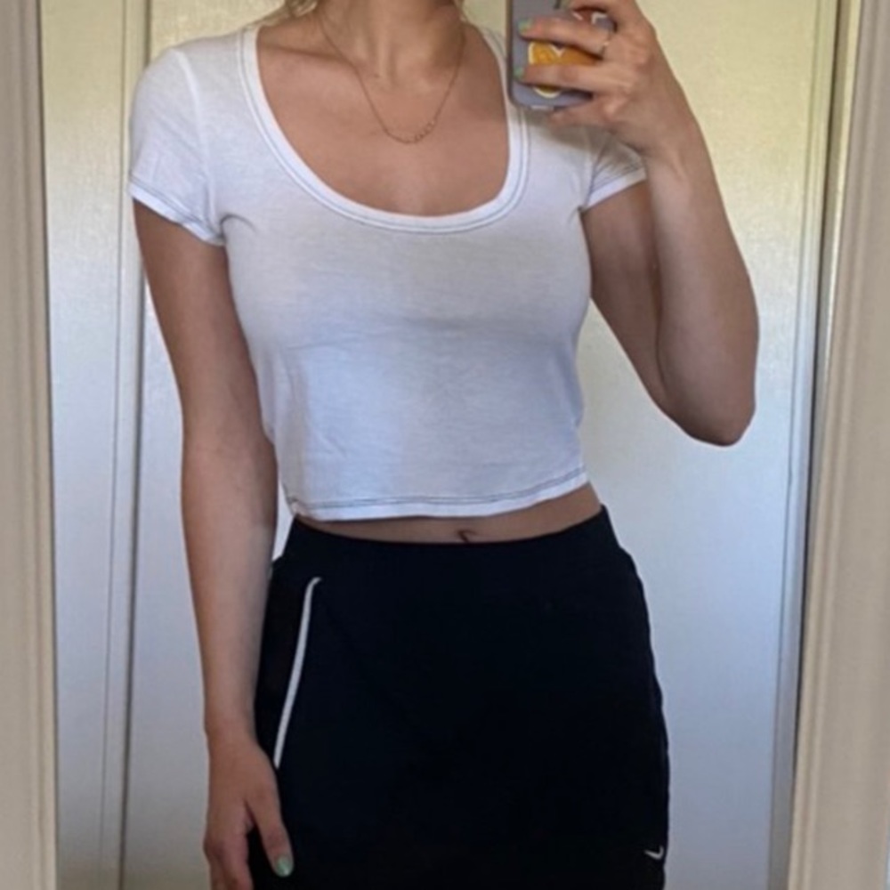 White crop top with navy trim. Very light. Size S